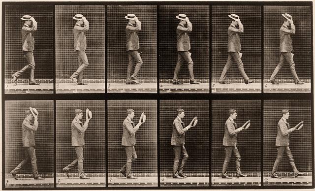 Walking, taking off hat, ca. 1884-1887